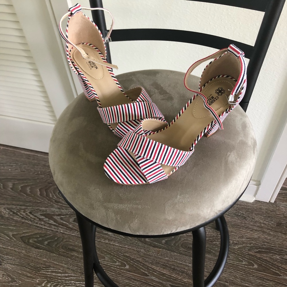 Size 7 block heel ankle strap sandal .  Cushion walk by Avon.